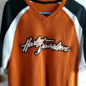 Mens Harley Davidson shirt. Size Large. Orange, black and white